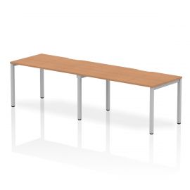 Evolve Plus 1400mm Single Row 2 Person Bench Desk Oak Top Silver Frame