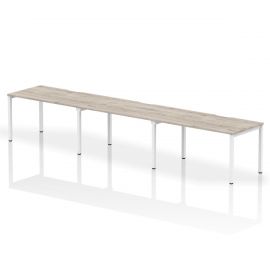 Evolve Plus 1400mm Single Row 3 Person Bench Desk Grey Oak Top White Frame