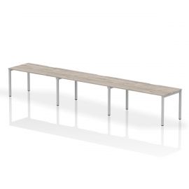 Evolve Plus 1600mm Single Row 3 Person Bench Desk Grey Oak Top Silver Frame